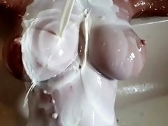 PORN in SLOW MOTION - Sex Doll gets her TITS splashed and soaked in milk then washed off in the bath