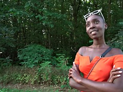 Hairless ebony babe gets paid to suck a big cock outdoors