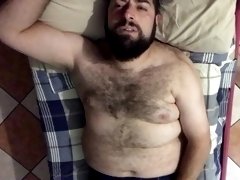 Big very hairy Italian bearded bear horny moaning wanking on the bed. Orgasm face Beautiful Agony